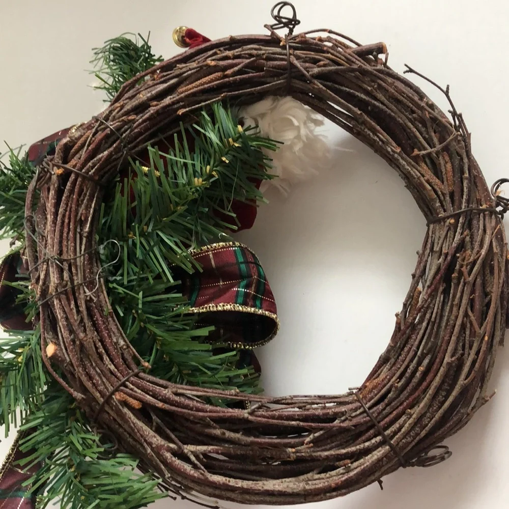 8” grapevine wreath with Santa, ribbon and greenery